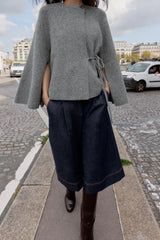 elegant grijs vest dames gecombineerd met jeans