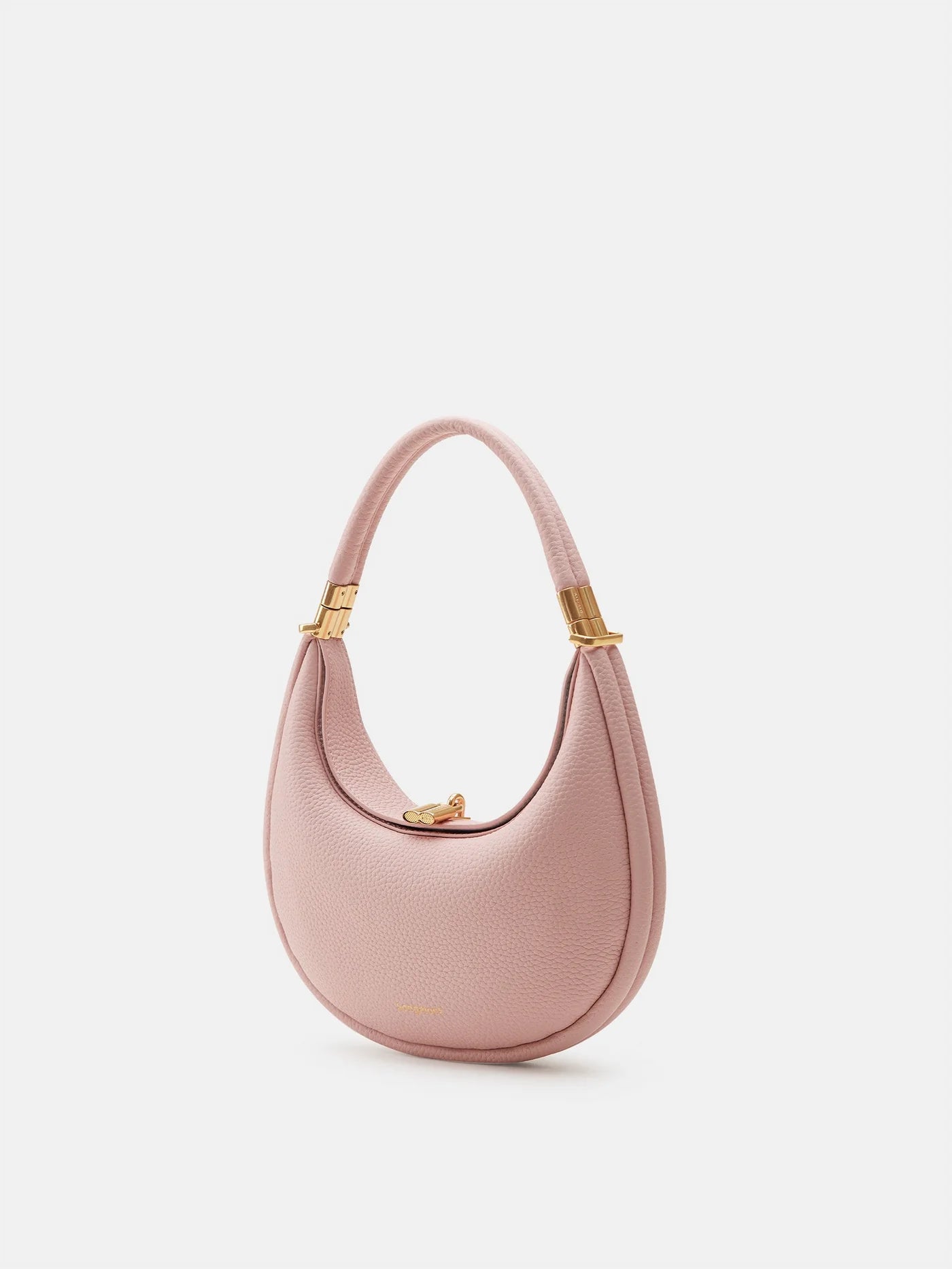 Roze tas die in vier stijlen kan worden gedragen: schoudertas, handtas, polsclutch of crossbody, met elegant design en goudkleurige accenten, beschikbaar in meerdere kleuren