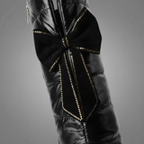 Zwarte overknee laarzen met gewatteerde schacht en grote strik achterop