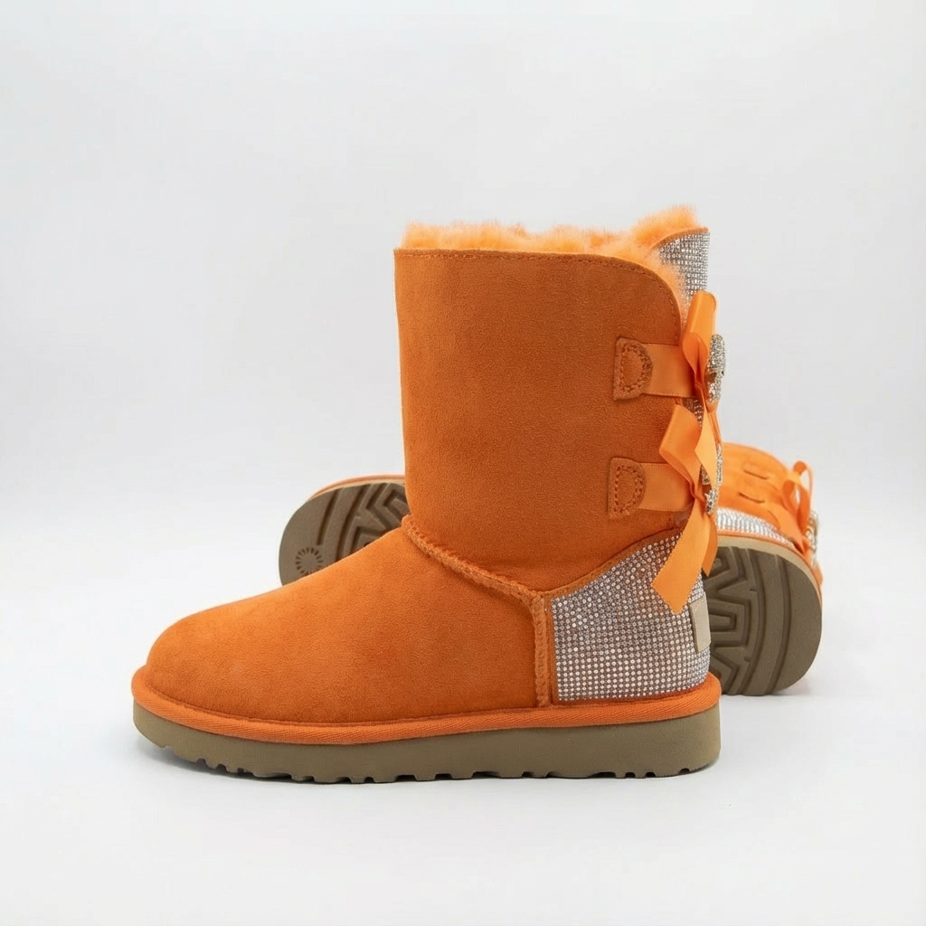 oranje winterlaarsjes met twee satijnen strikken en faux fur binnenkant