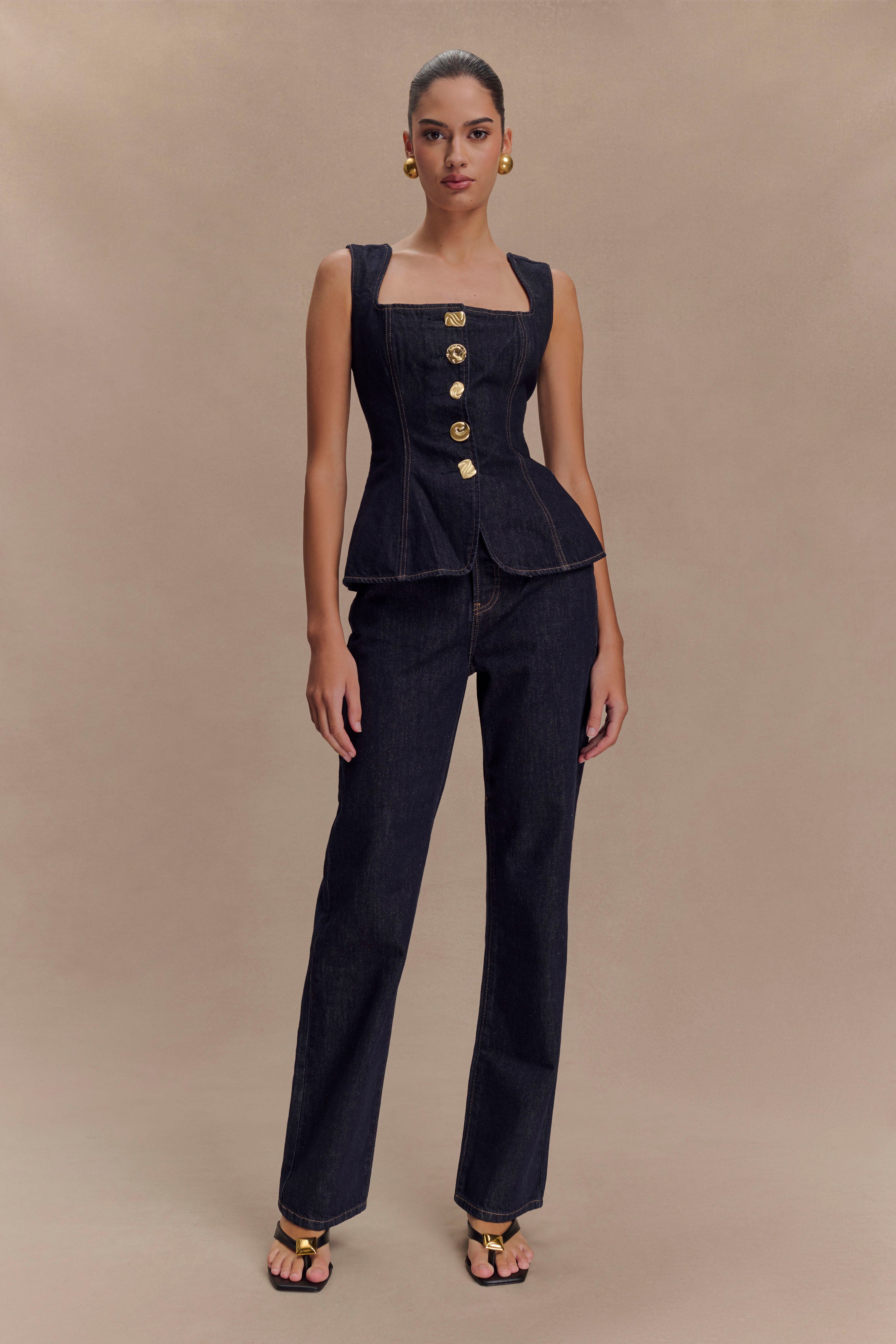 donkerblauwe denim set met gouden knopen