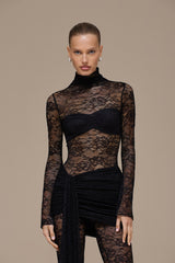 Maeriva Lace Jumpsuit | Zwarte kanten jumpsuit met hoge hals & drapage