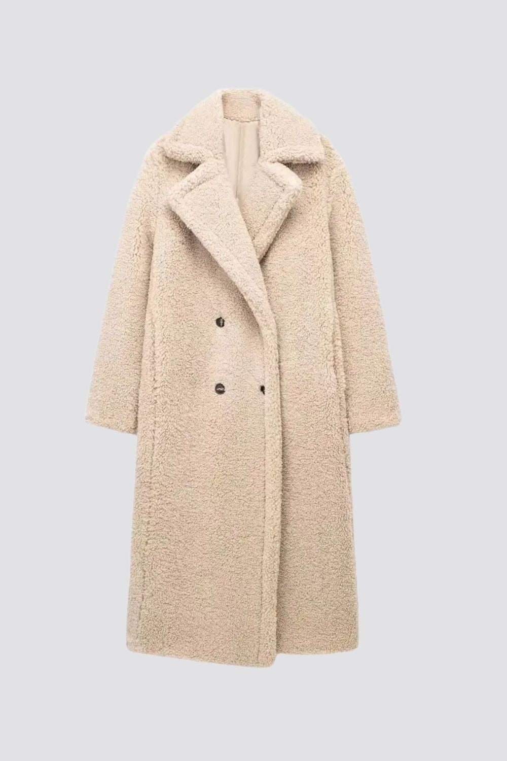 Luxe Teddy Coat, een zachte faux fur jas met teddy-textuur en een chique uitstraling.