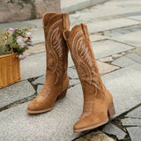 bruine hoge western boots met blokhak en stiksels