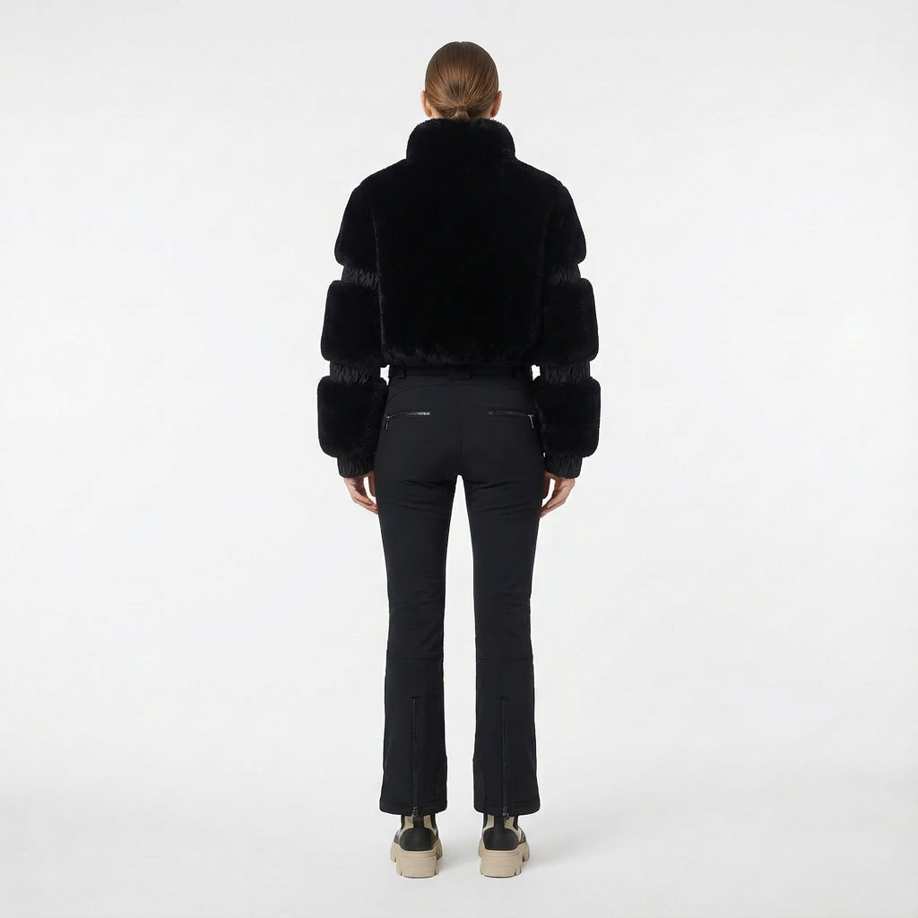 zwarte ski jumpsuit dames met getailleerde pasvorm achteraanzicht