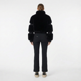 zwarte ski jumpsuit dames met getailleerde pasvorm achteraanzicht