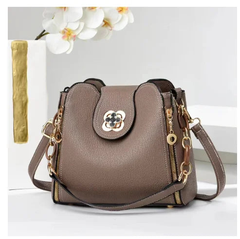 Luxe taupe bucket schoudertas met gouden details – Serenya Luxe Schoudertas