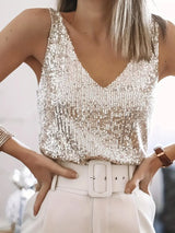 champagnekleurige glittertop met diepe V-hals