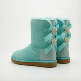 turquoise winterlaarzen dames met drie satijnen strikken