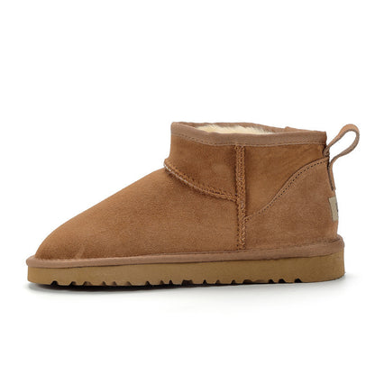 CozyFeet – comfortabele camel kleurige winterstappers van schapenvacht met wollen voering.