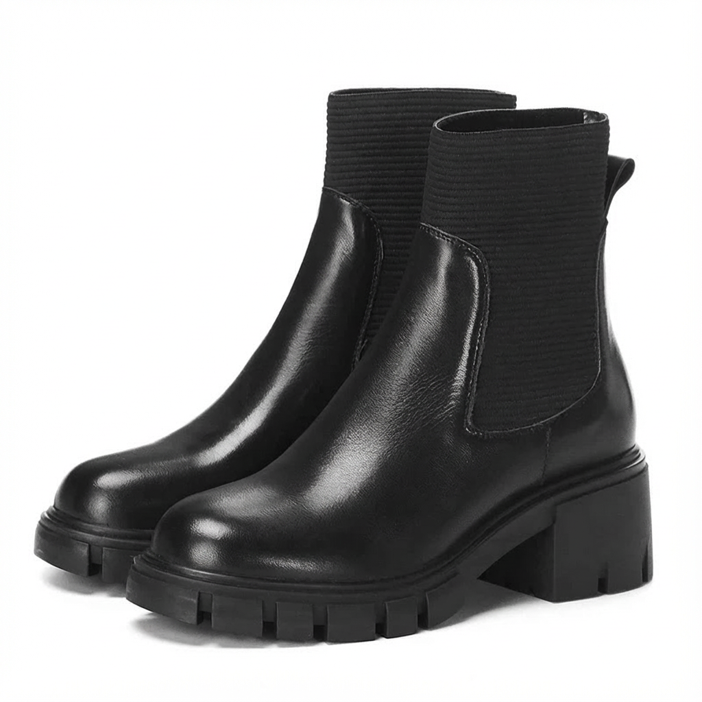 zwarte leren chelsea boots met blokhak en profielzool