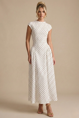 witte maxi jurk met zwarte polka dots en getailleerde taille dames