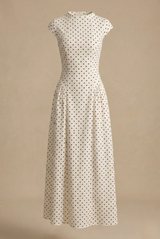 crème maxi jurk met zwarte polka dots en getailleerde taille dames