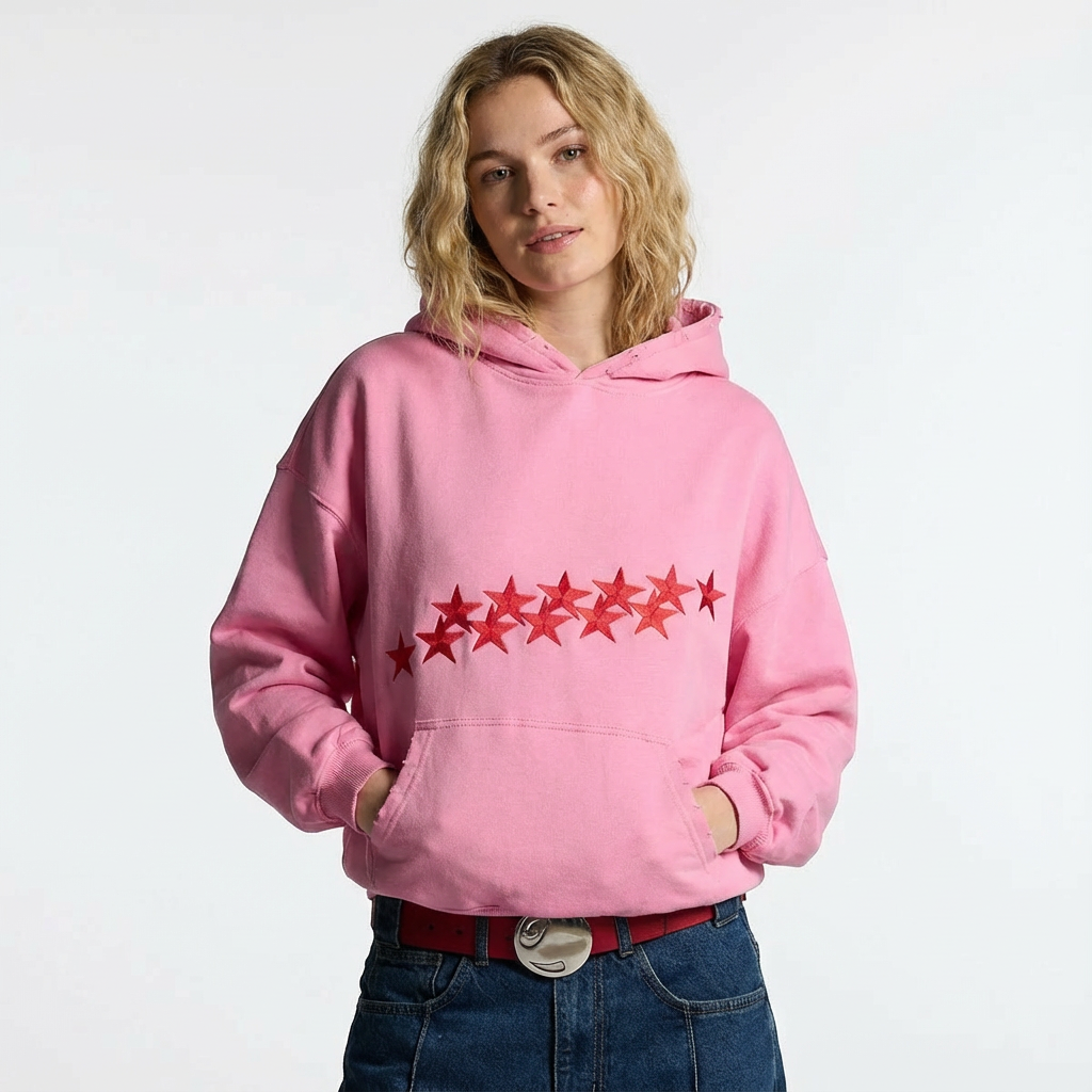 roze hoodie met sterrenprint gedragen met jeans