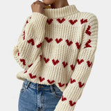 witte gebreide dames trui met rode hartjespatroon, casual look
