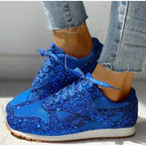 Blauwe glitter sneakers met glanzende details en trendy uitstraling