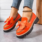 oranje chunky loafers met grote strik en glanzende afwerking