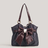 zwarte polkadot schoudertas met grote bruine strik dames