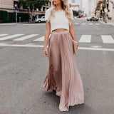 Roze plissé rok met witte top