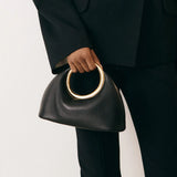 Orella | Sculptural Ring-Handle Handbag in Vegan Leather (Ivory/Black) 