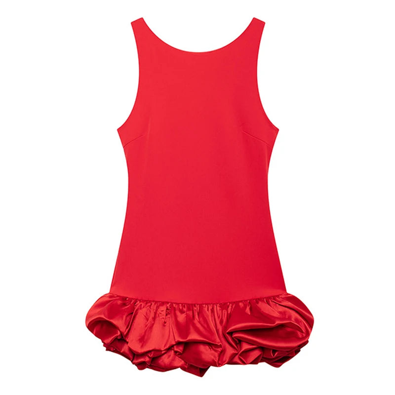 Flair Ruffle Mini Dress – Een speelse en elegante mini-jurk met opvallende ruches, perfect voor feestdagen en speciale evenementen.