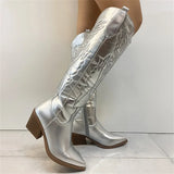 Zijkant Solvara boot met western details