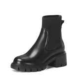 zijaanzicht van zwarte leren chelsea laars met blokhak