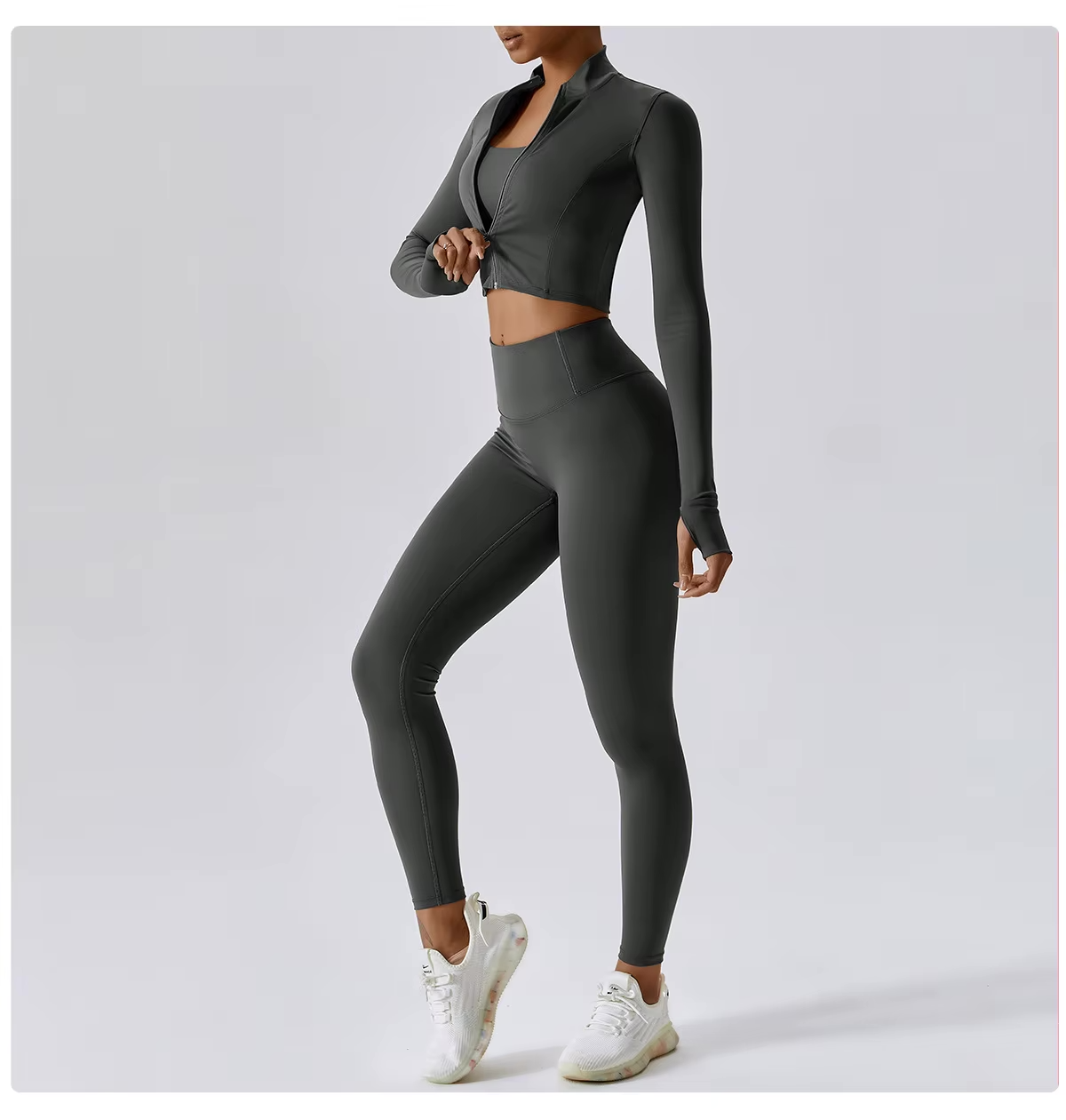 Naadloze fitness set met high-waist legging en cropped zip-up top, squat-proof en ademend voor elke workout.