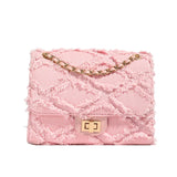 roze tas met denim structuur en goudkleurige details