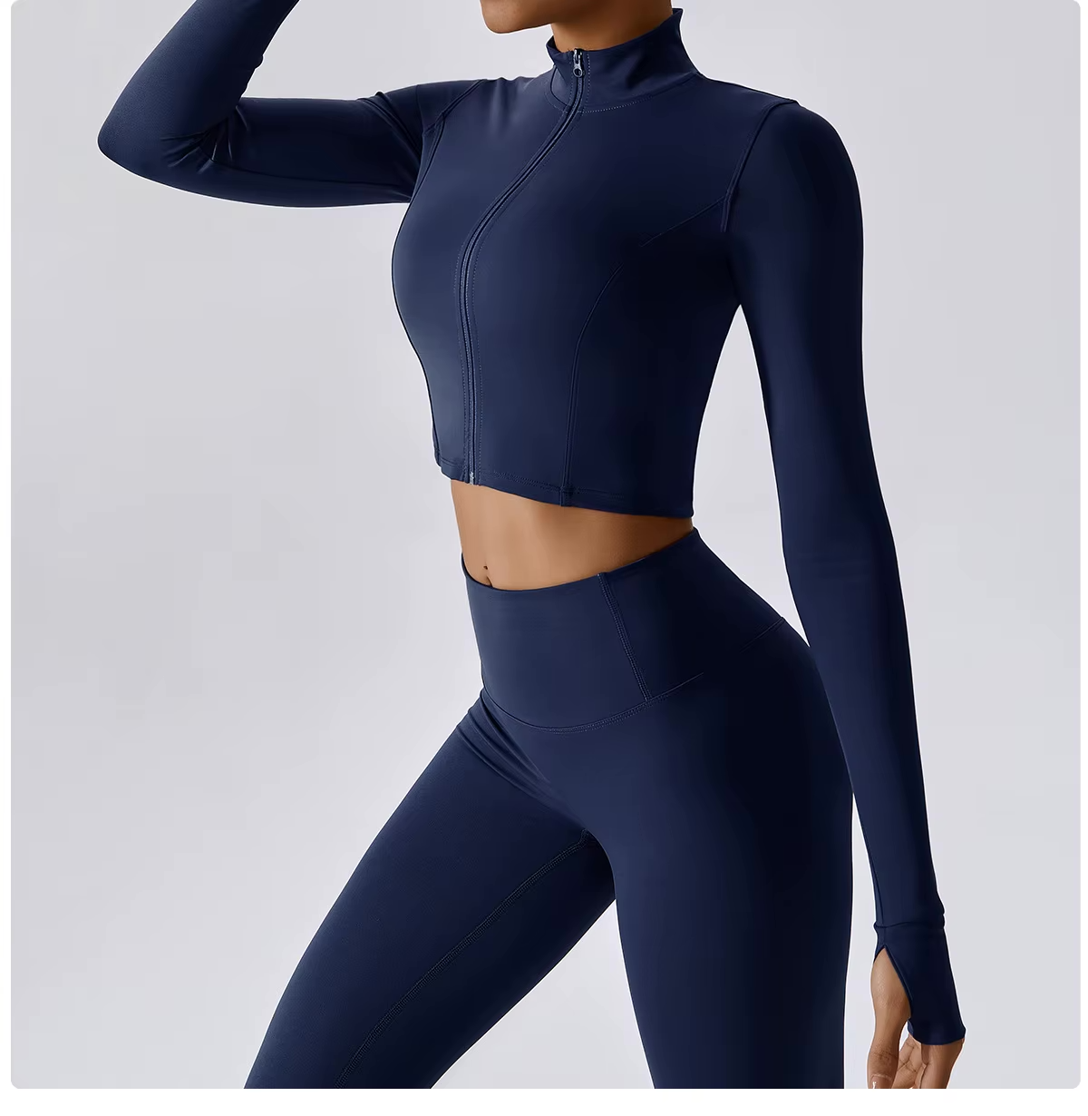 Naadloze fitness set met high-waist legging en cropped zip-up top, squat-proof en ademend voor elke workout.