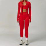 rode sportset dames met legging sport bh en jasje studiofoto
