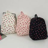 Urban Cord Strawberry Pack, ruime corduroy rugzak met aardbeienprint, perfect voor school en reizen.