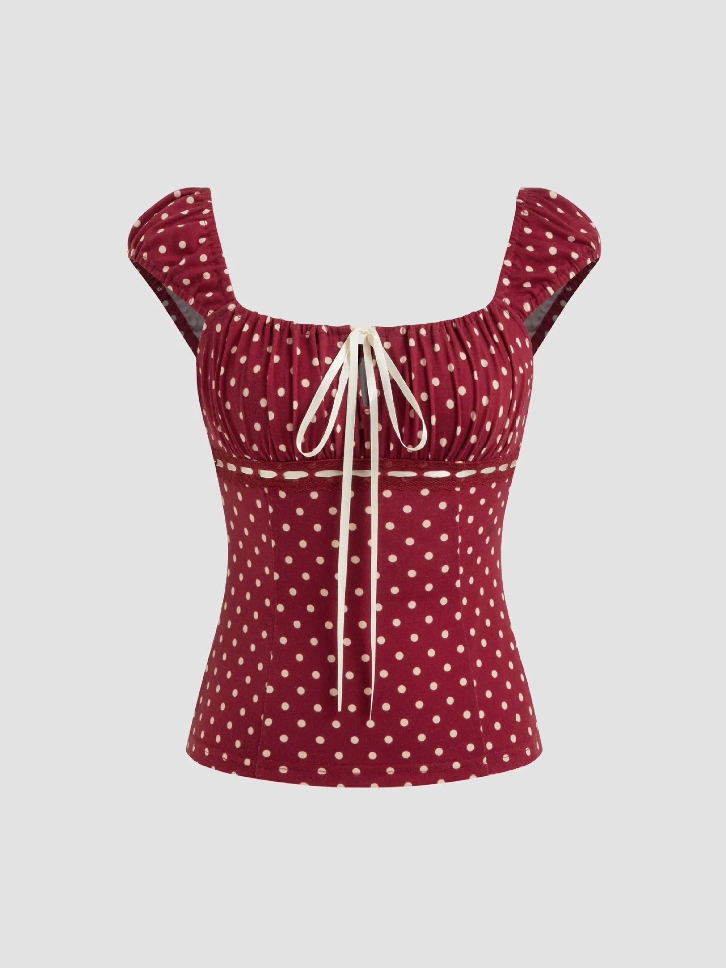Liora top met stippenprint en aangesloten pasvorm in rood