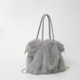 grijze teddy handtas met zachte structuur en schakelketting