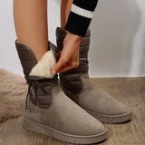 taupe winterlaarzen met touwsluiting en faux fur detail
