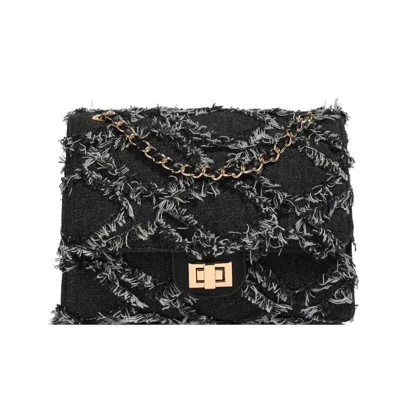 zwarte denim-look tas met kettinghengsel