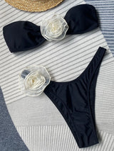 zwarte bandeau bikini met witte bloem
