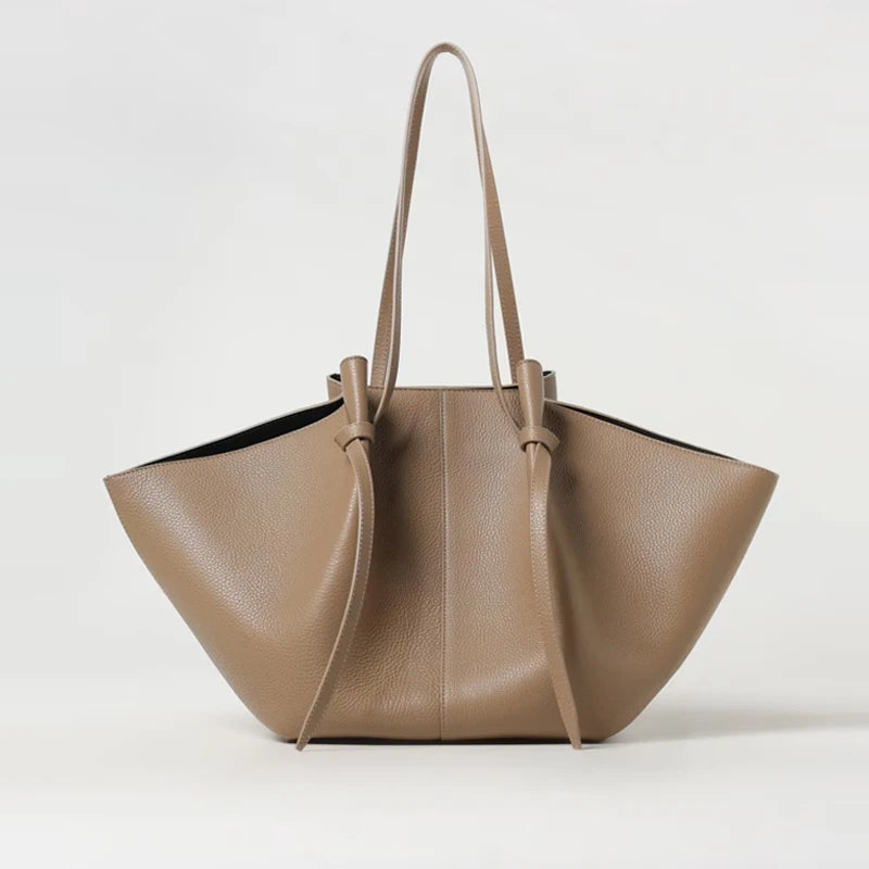 beige-taupe totebag met strikdetail en gestructureerd leer