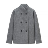 grijze double breasted jas dames oversized fit minimalistisch