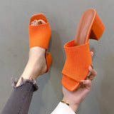 oranje zomerse muiltjes met hak en stretchy knitband