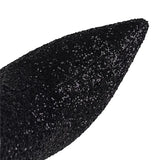 close-up van glitterstructuur en puntneus laars