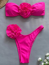 Fuchsia bikini met roze bloem