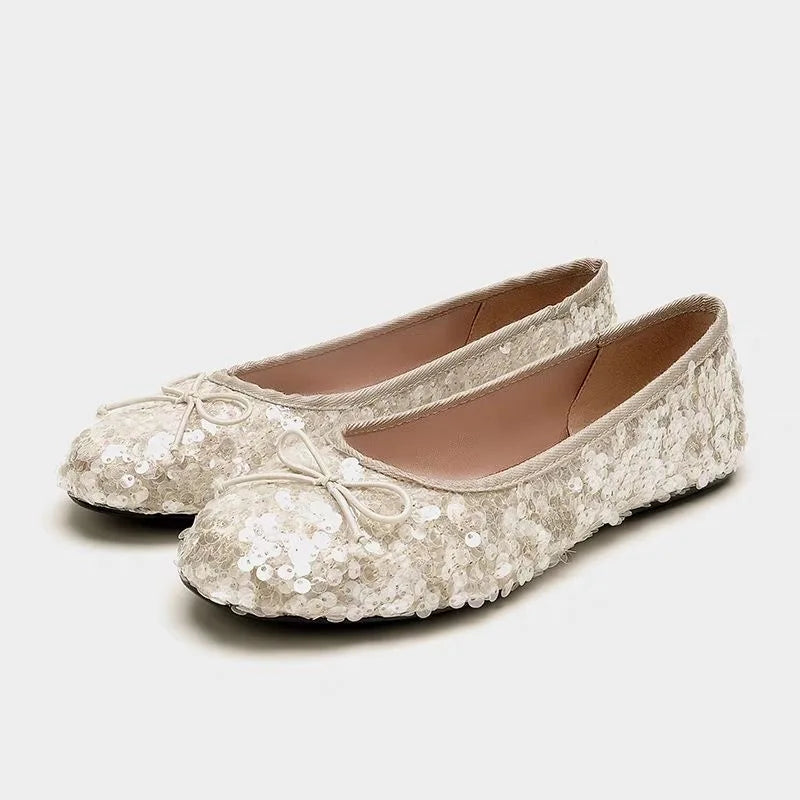 pailletten ballerina schoenen close-up met strikdetail