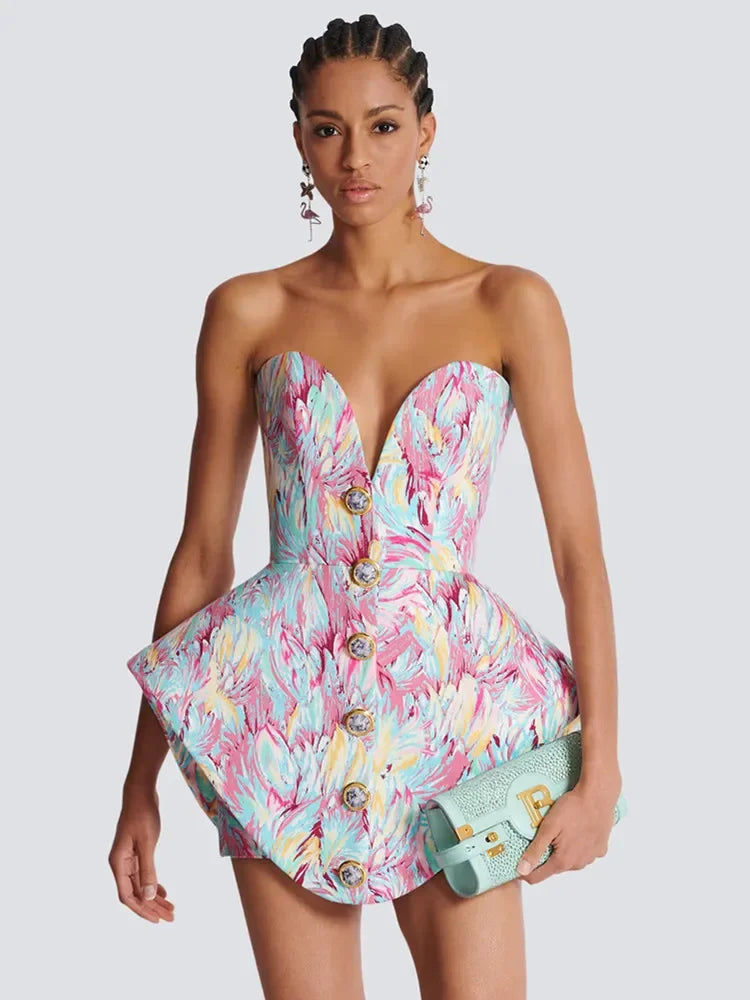 Strapless mini jurk met levendige abstracte print en sculpturaal silhouet