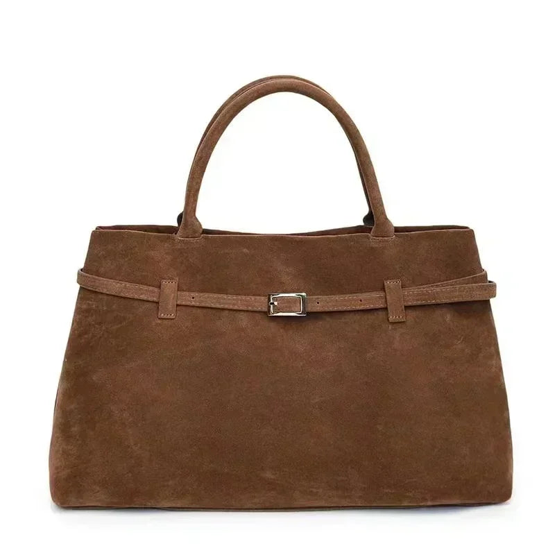 Bruine luxe handtas met gesp en suède structuur