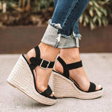 Zwarte espadrilles met sleehak en open teen