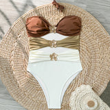 chique badmode dames met earthy kleuren