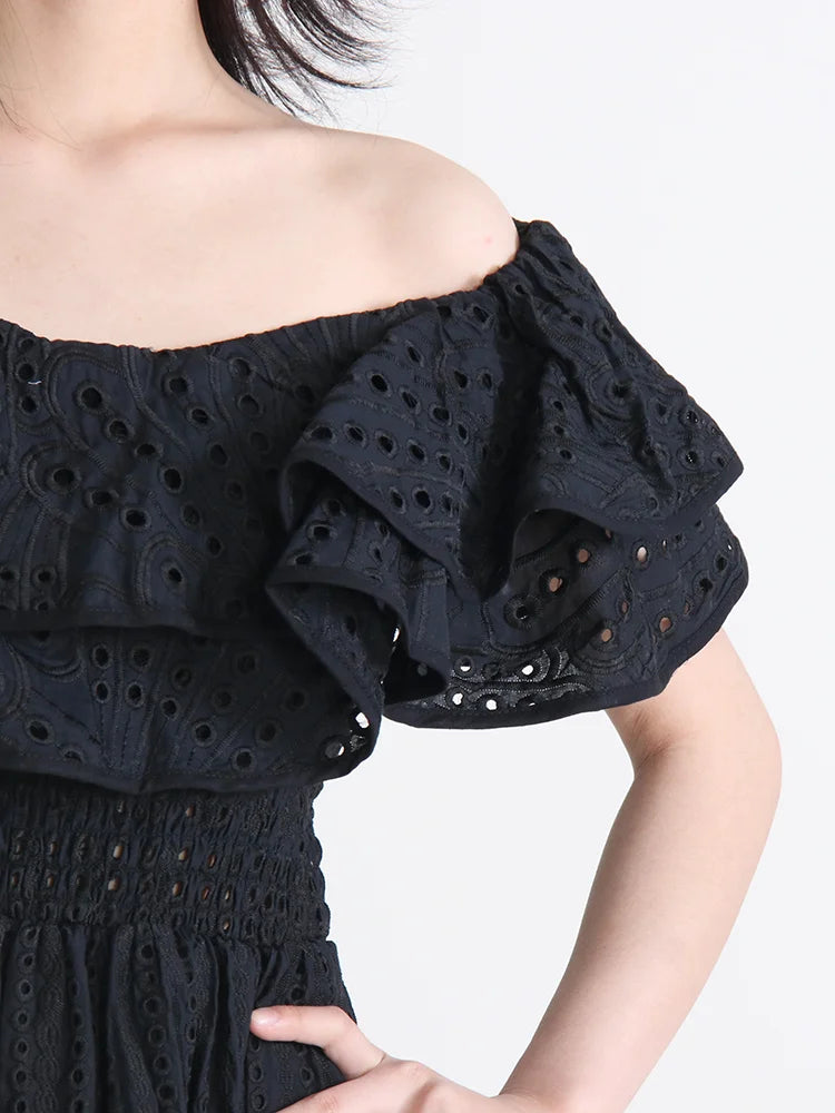 zwarte elegante off shoulder jurk met broderie details