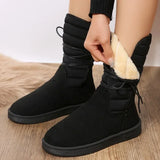 zwarte winterboots met beige voering en stevige zool