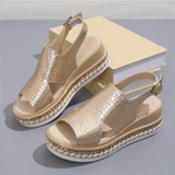 zilverkleurige plateau sandalen met glanzende afwerking en open teen
